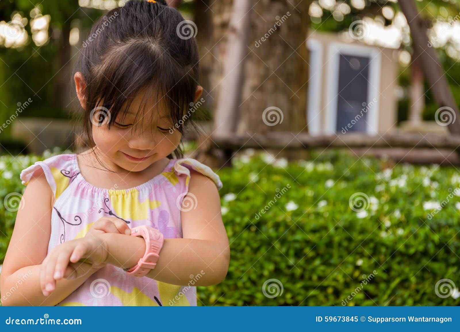 little-girl-using-smartwatch-smart-watch-young-girl-smartwatch-smart-watch-child-standing-garden-her-wrist-59673845.jpg